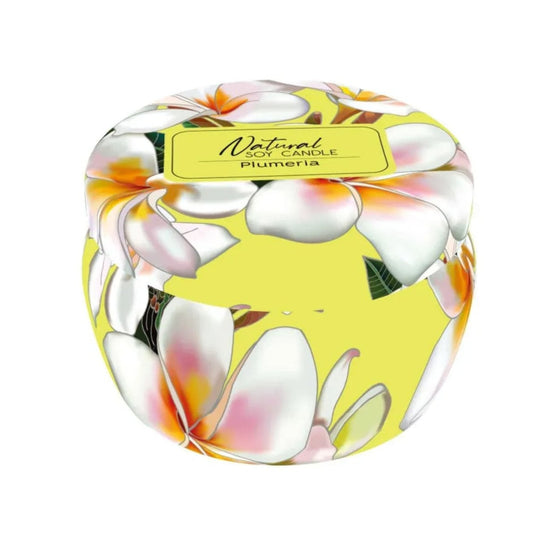 Decorative candle with floral design and 'Plumeria' label on a white background